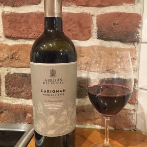 Les Fleurs Sauvages Carignan bottle and glass Les Fleurs Sauvages Carignan bottle and glass