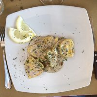 Tortelli di ricotta e limone con gorgonzola e noci